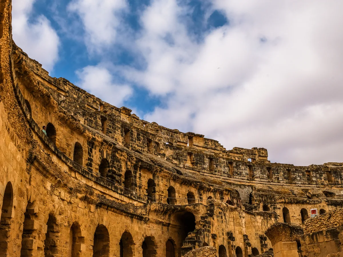 The arena and seating tiers inside the El Jem amphitheatre